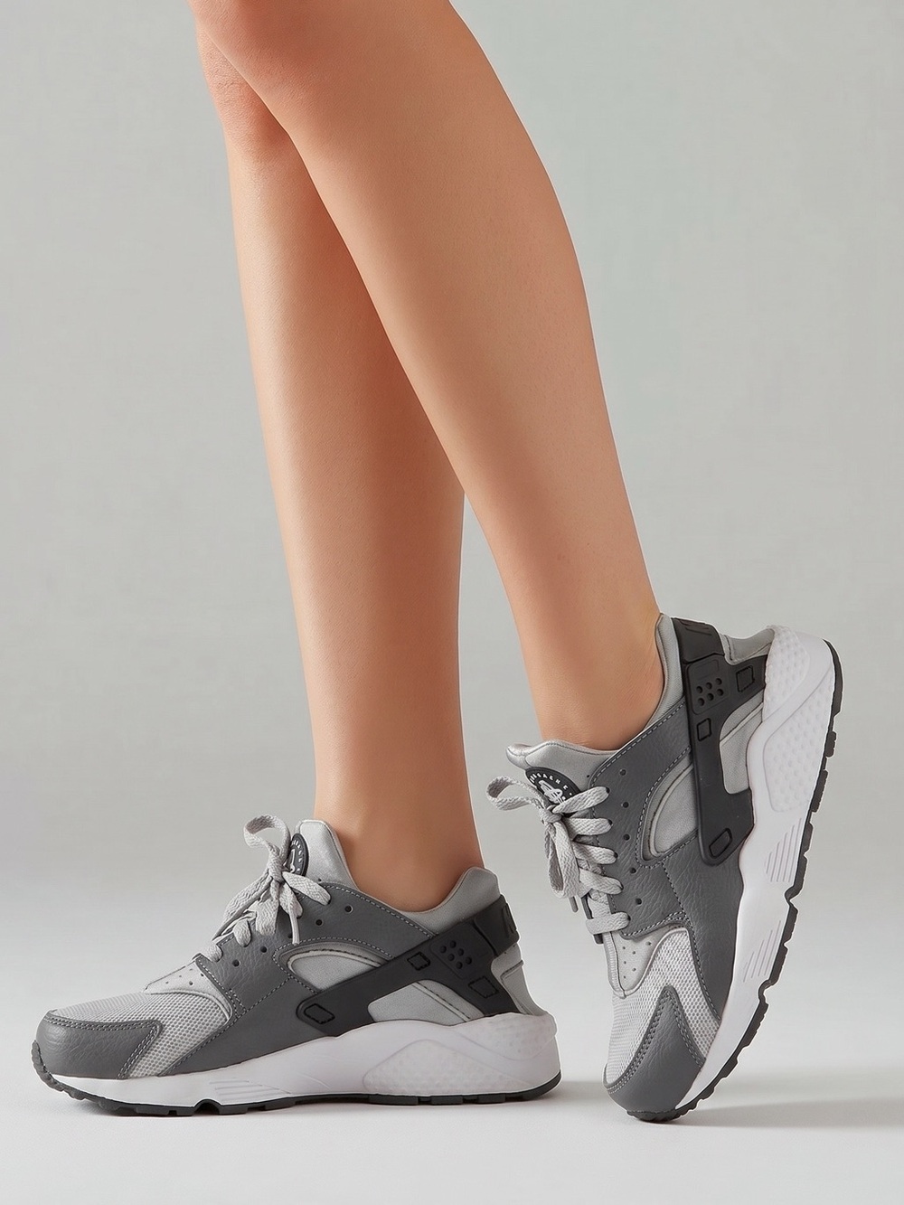 Nike Women’s Gray & White Huarache Sneakers
